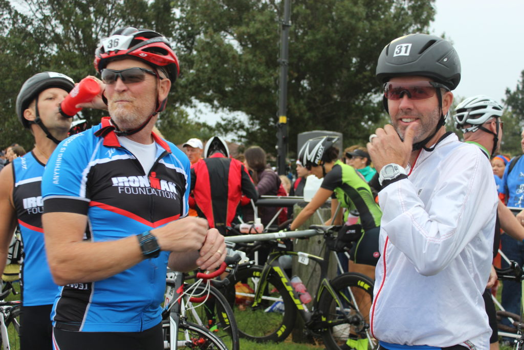 TEAM IMF Athletes Mark Mitchell, and Steve Cooper, chit chatting before the Time Trial Bike Start. 