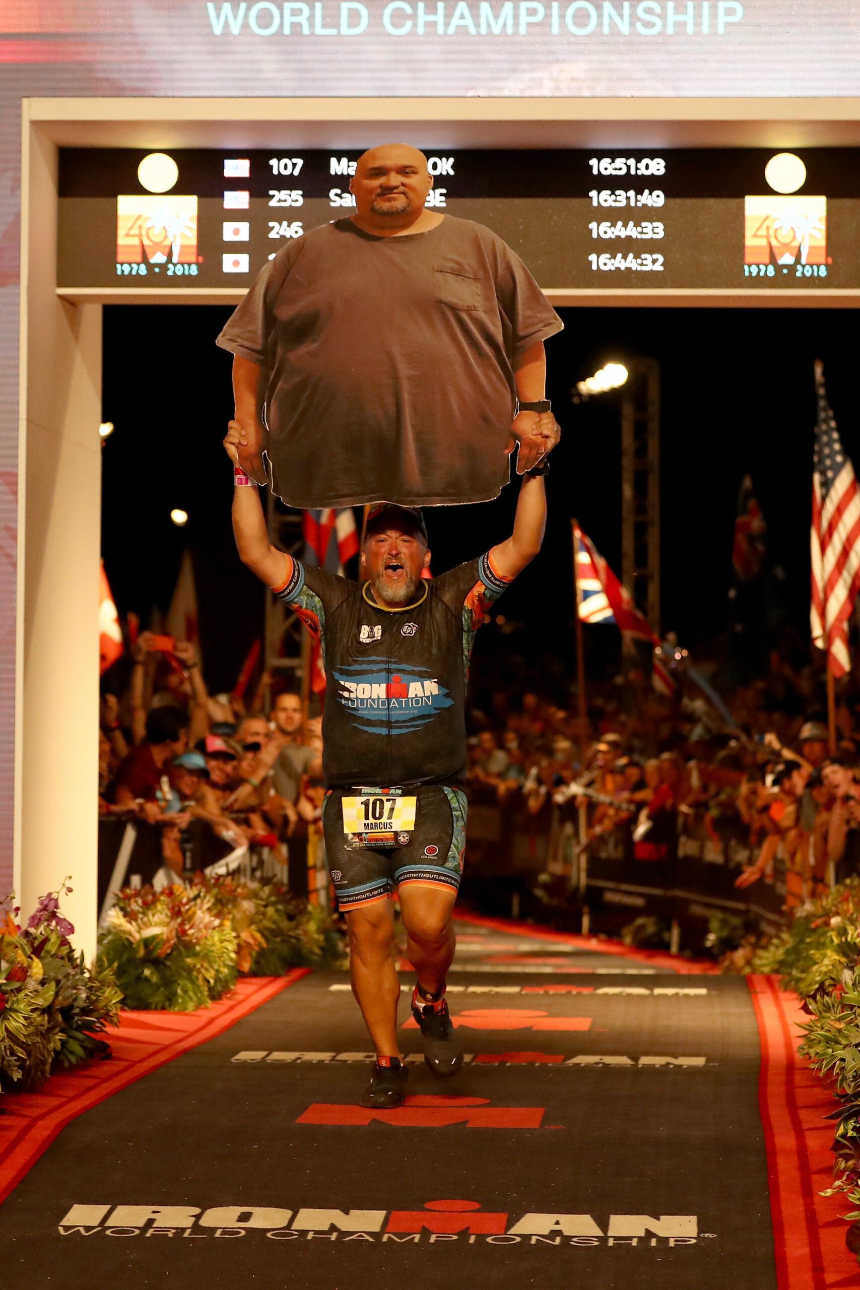 Marcus Cook, finishes the IRONMAN World Championship on October 13, 2018 in Kailua-Kona, HI.  (Photo by Al Bello/Getty Images for IRONMAN)