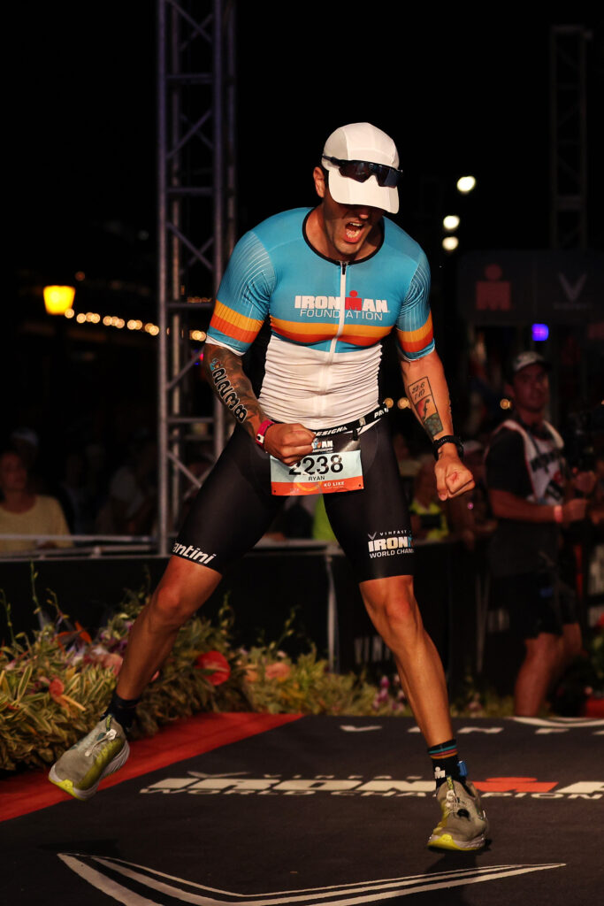 Country music singer/song writer, Ryan Kinder, celebrates after finishing the IRONMAN World Championship on October 8, 2022 in Kailua-Kona, HI. (Photo by Tom Pennington/Getty Images for IRONMAN)